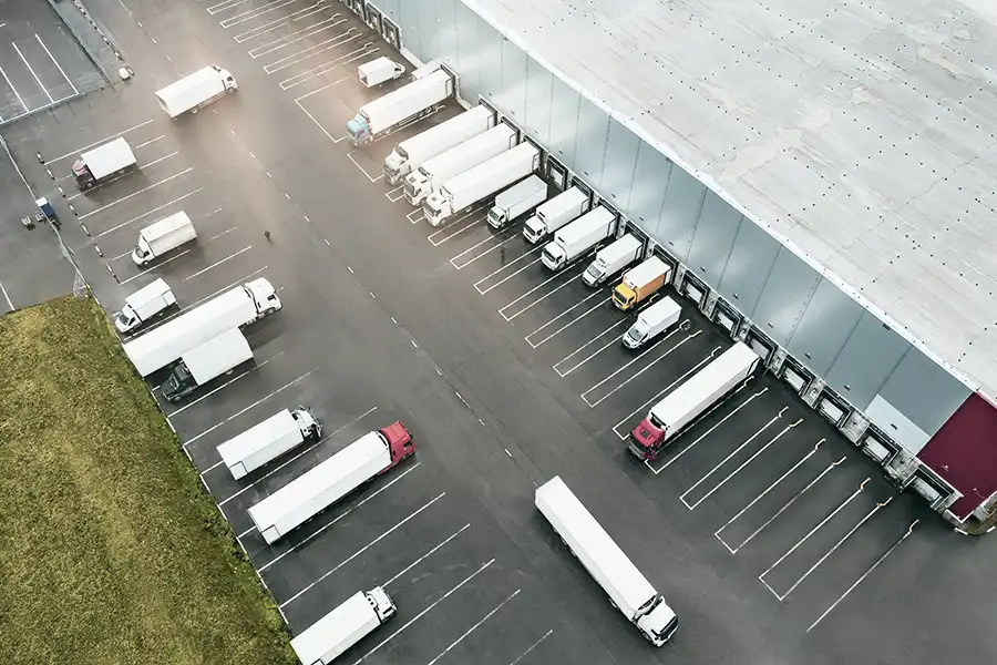 Commercial trucks representing auto and fleet insurance.